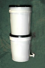 Gravity Feed Ceramic Filter Buckets – New Filter – Removes Fluoride !!